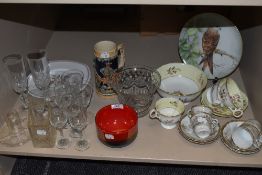An assortment of items including vintage cups and saucers including delicate oriental hand painted
