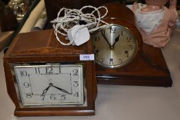 Two vintage mantle clocks, one early 20th century with inlaid mahogany case, the other around