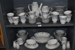 A large amount of Noritake blue hill dinner service including tea and coffee pots, serving dishes,