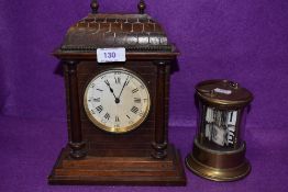 A vintage brass and glass desk top calendar and mahogany cased mantel clock.