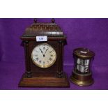 A vintage brass and glass desk top calendar and mahogany cased mantel clock.