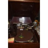 A wooden cased HMV wind up gramophone with historical conversion to play vinyl LP records.