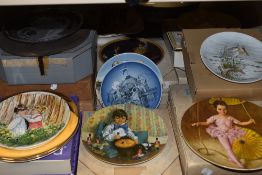 A variety of display plates, including Wedgwood,Kaiser and Reco.