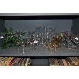 A collection of vintage glasses, various styles and colours.