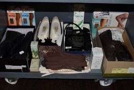 A mixed collection of vintage and retro items including stockings, gloves, shoes,bag, perfume and