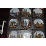 A collection of display plates having French scenes and similar.