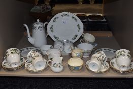 A collection of Crown Staffordshire table ware having dog rose pattern with green, yellow