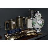 A mixed lot containing pewter tankards, oriental lidded jar, and a selection of flat ware