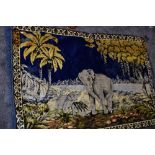A large wool or wool blend rug or tapestry depicting scene of elephants and landscape.