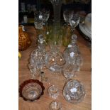 An assortment of glass including cut glass bowls, perfume bottle napkin rings and similar.