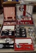 A selection of flat ware amongst which are boxed sets of spoons sugar nips, tea strainer, boxed