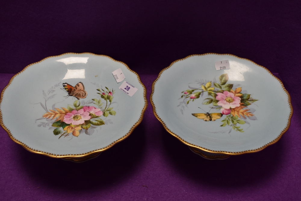 Two vintage cake stands having duck egg blue ground,gilt edging and hand painted dog rose and fern