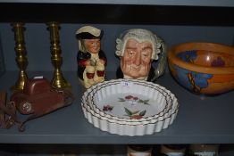 A mixed lot including Royal Worcester Evesham flan dishes,a pair of brass candle sticks,character