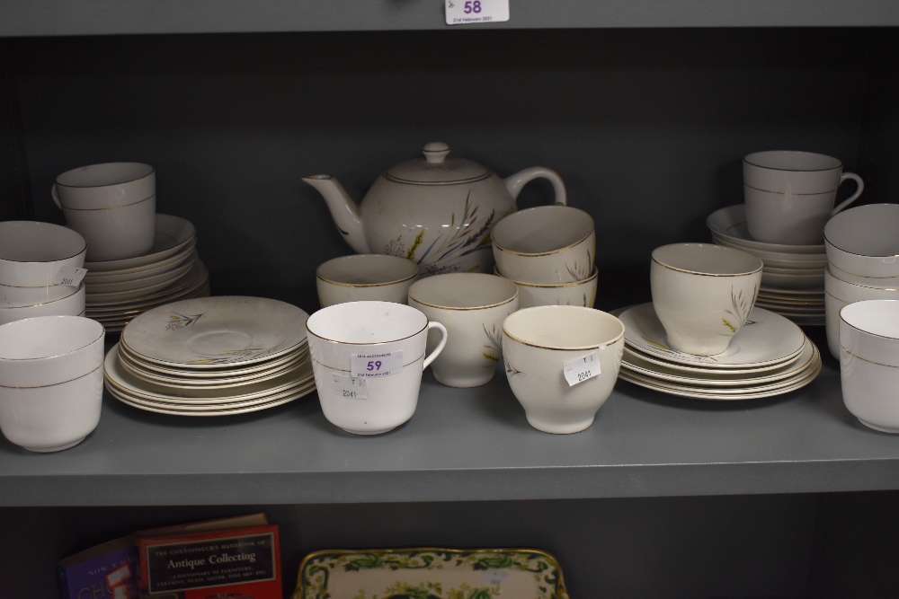 A large selection of tea wares including partial service by Barratts delphatic White Table ware