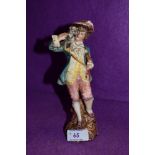 An antique slip cast figure or figurine in a French style impressed 1533 (AF)