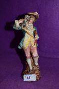 An antique slip cast figure or figurine in a French style impressed 1533 (AF)