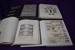 Four albums of Foreign Stamps, mint and used, mostly Europe, including Switzerland, Germany,