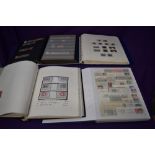 Four albums of Foreign Stamps, mint and used, mostly Europe, including Switzerland, Germany,