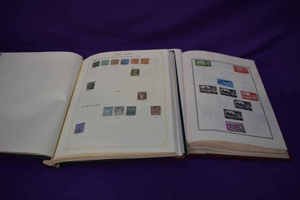 Two partly filed albums of World Stamps including GB 1960's-1970's, Egypt, French Colonies,