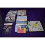 A large collection of GB Presentation Packs, Booklets, Loose Stamps in envelopes and a 1989 Year