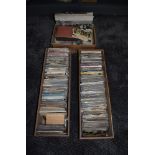 A very large collection of vintage postcards in three boxes 2000+, UK, Europe, World interest