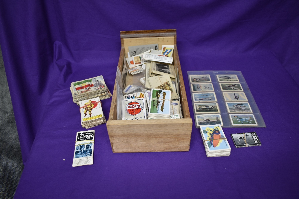 A box of Trade Cards and Cigarette Cards including Allen's Cure Em Quick, Nav's, A & BC, Flags of