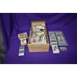 A box of Trade Cards and Cigarette Cards including Allen's Cure Em Quick, Nav's, A & BC, Flags of