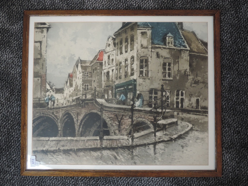 A print, A street in Flanders, 45 x 55cm, framed and glazed