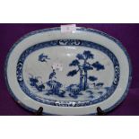 An antique meat or similar charger plate Chinese export hard paste with hand decorated fantasy scene