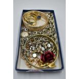 A small selection of plated jewellery including bangles, scarf ring, Scandinavian pins, Ingersoll