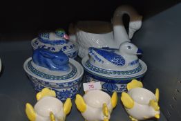 A mixed lot of lidded dishes having ducks and rabbits to lids,three egg cups and a planter in the