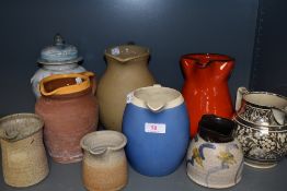 A selection of earthen ware and similar ceramic water jugs