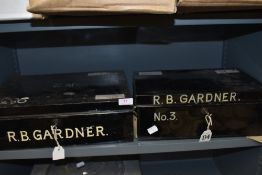 Two vintage lockable metal deed boxes both having R.B Gardener to sides.