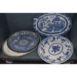 A selection of large ceramic plates and chargers including wash bowl and similar