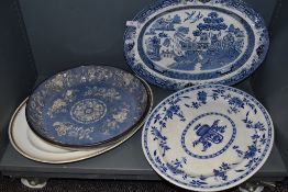 A selection of large ceramic plates and chargers including wash bowl and similar