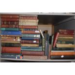 A shelf full of vintage and antique books amongst which are classic novels, poetry and more.