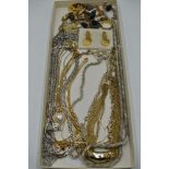 A selection of costume jewellery including necklaces, pendants, cufflinks, etc