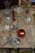 An assortment of vintage glass ware including dishes, fruit bowl,vases and more.