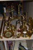 A selection of fine antique and later brass fire side items including 2 candle stick pairs fire dogs