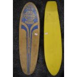 Two retro junior skate boards.