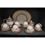 A partial Royal Grafton 'majestic' dinner service comprising of platters, cups and saucers, tea