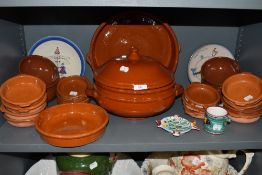 A selection of terracotta tapas style plates and similar