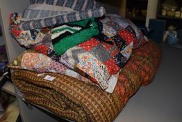 A mixed lot of vintage and retro items including seeping bag, two patch work cushions and a peg