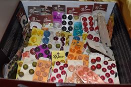 Approximately fifty cards of vintage buttons, various colours, sizes and styles.