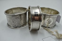 Three HM silver napkin rings, all having engine turned decoration, approx 76g