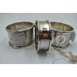 Three HM silver napkin rings, all having engine turned decoration, approx 76g