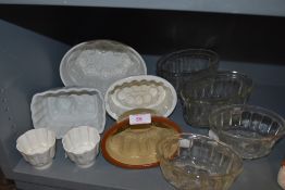 A selection of ceramic jelly moulds including Shelley and similar styles