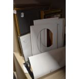 A selection of frames and mounts, various sizes and styles.