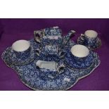 An antique chintz breakfast tray and tea set unmarked and un named most pieces having damage