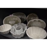 Seven vintage ceramic jelly moulds.